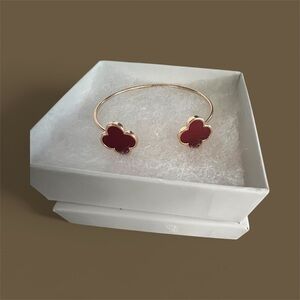Elegant Gold and Red Clover Bracelet